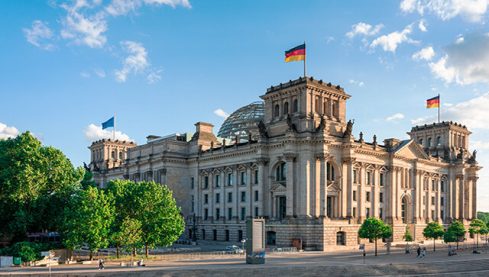 Reichstag with german flag, Berlin, Germany