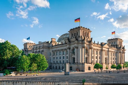 Reichstag with german flag, Berlin, Germany